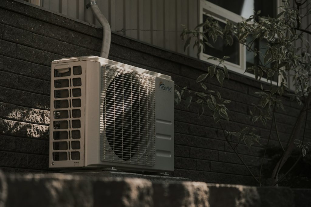 Air conditioner outdoor unit mounted on a wall