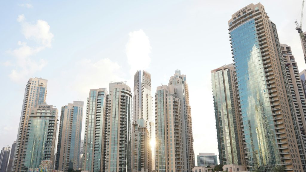 Residential towers in Dubai under a clear sky